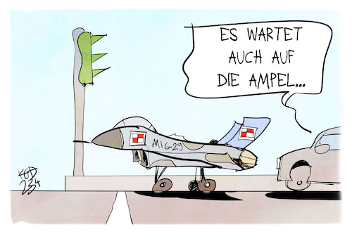 Cartoon: Kampfjets-Genehmigung (medium) by Kostas Koufogiorgos tagged karikatur,koufogiorgos,mig,kampfjet,ampel,warten,ukraine,karikatur,koufogiorgos,mig,kampfjet,ampel,warten,ukraine