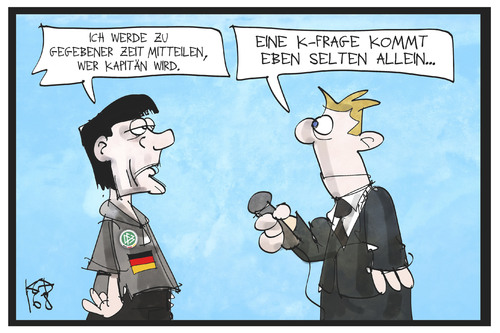 Cartoon: Löws K-Frage (medium) by Kostas Koufogiorgos tagged karikatur,koufogiorgos,illustration,cartoon,frage,kapitän,reporter,journalist,bundestrainer,entscheidung,interview,sport,fussball,spielführer,karikatur,koufogiorgos,illustration,cartoon,frage,kapitän,reporter,journalist,bundestrainer,entscheidung,interview,sport,fussball,spielführer